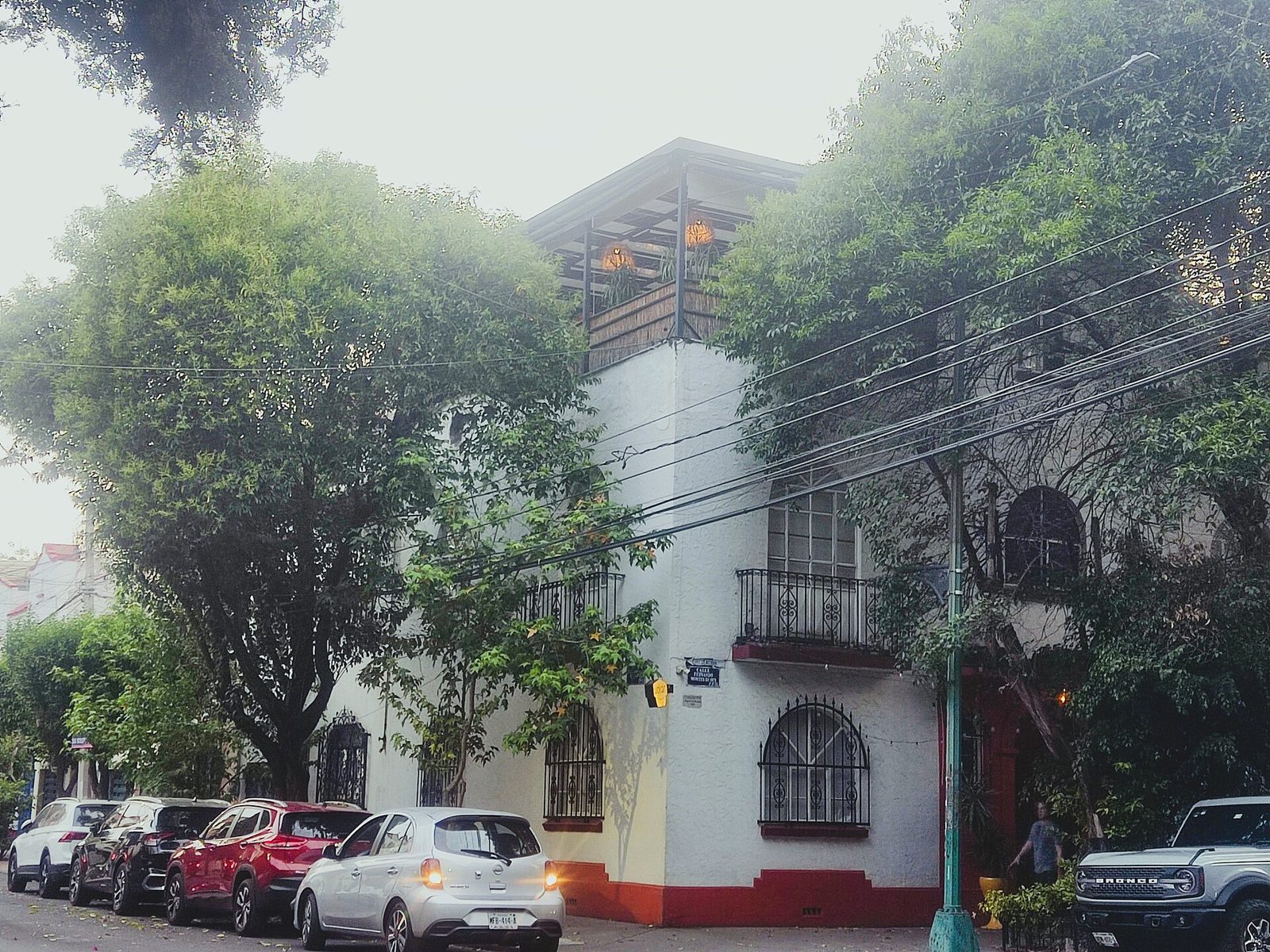 The white corner building that houses Esquina Común